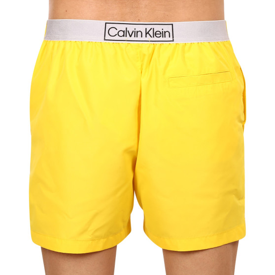 Stroje kąpielowe męskie Calvin Klein żółty (KM0KM00787 ZGR)